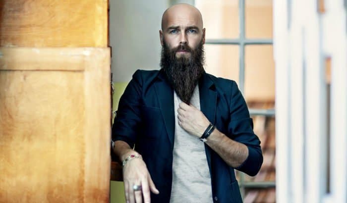 bald man with a long beard at terminal length