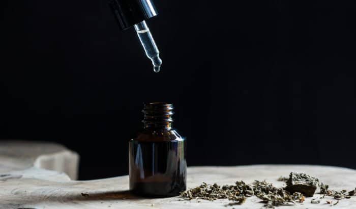 beard growing oil on a dark background