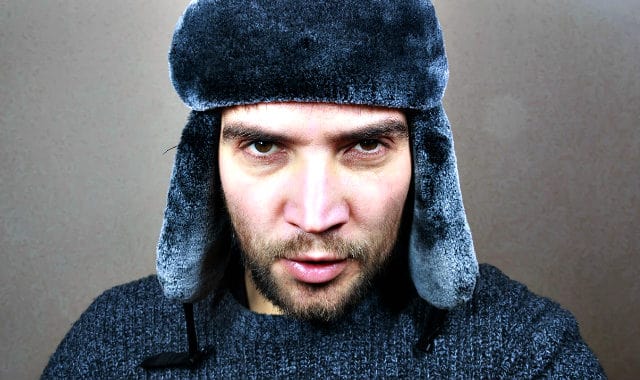 man with short beard and winter hat