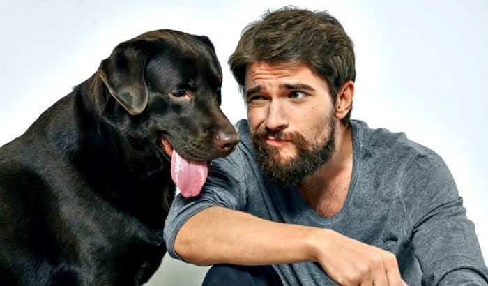 bearded man and a dog