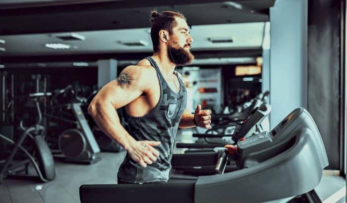 bearded man on a treadmil