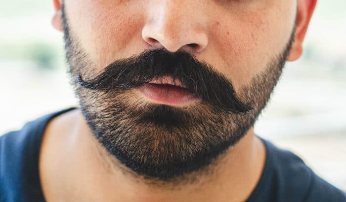 handlebar mustache with stubble