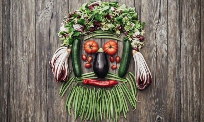 fruits and vegetables assorted to look like bearded man