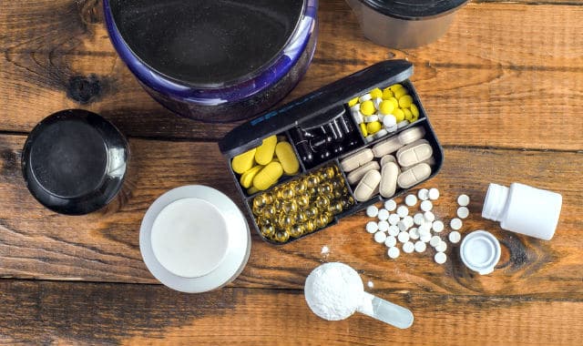 creatine and other supplements on a table