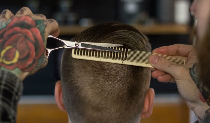 man cutting hair