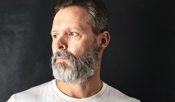 man with gray full beard