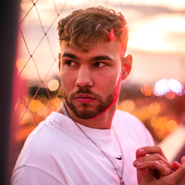 man with long thick stubble