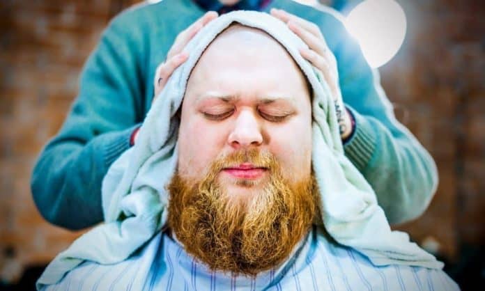 man with split-end beard at barbershop