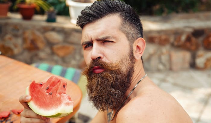 man with thick beard and patchy cheeks